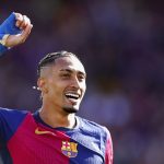 WATCH: Raphinha walks across Barcelona pitch on his knees after winning La Liga